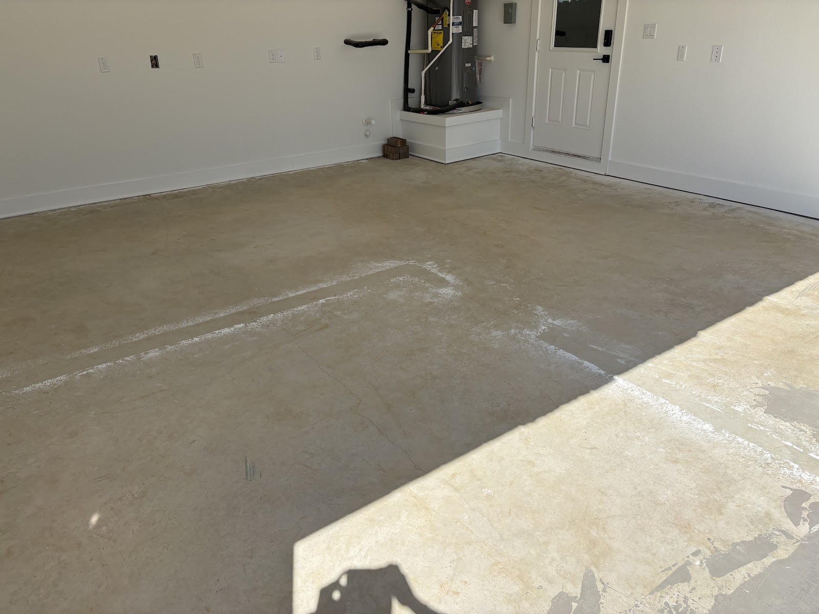 Garage concrete floor before resurfacing and coating